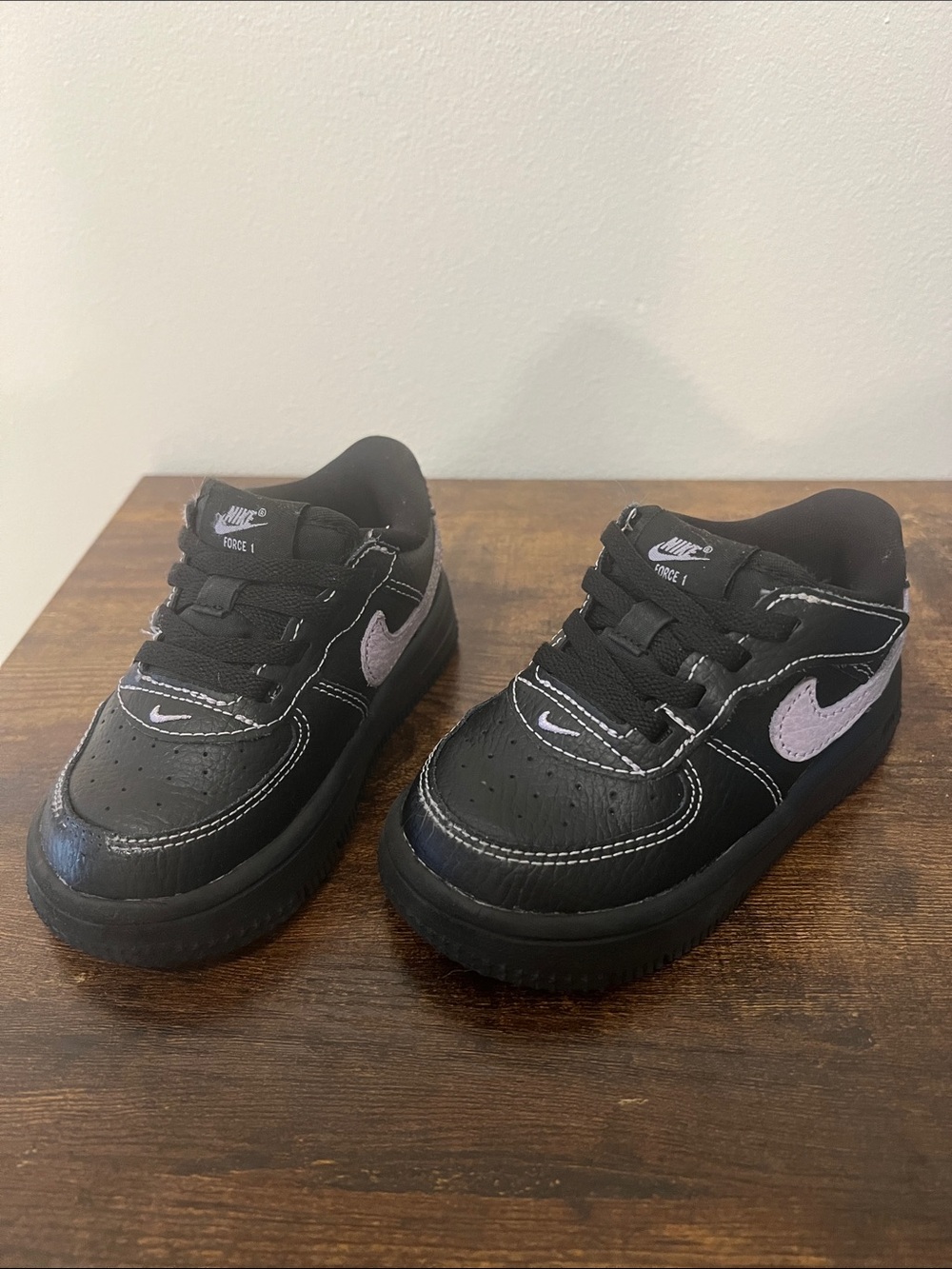 Nike Kids Black Sneakers with Light Purple Swoosh